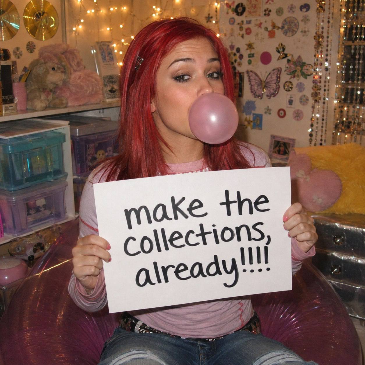 Ember blowing bubblegum in a late-90s bedroom and holding a sign that says make the collections, already!!!!!